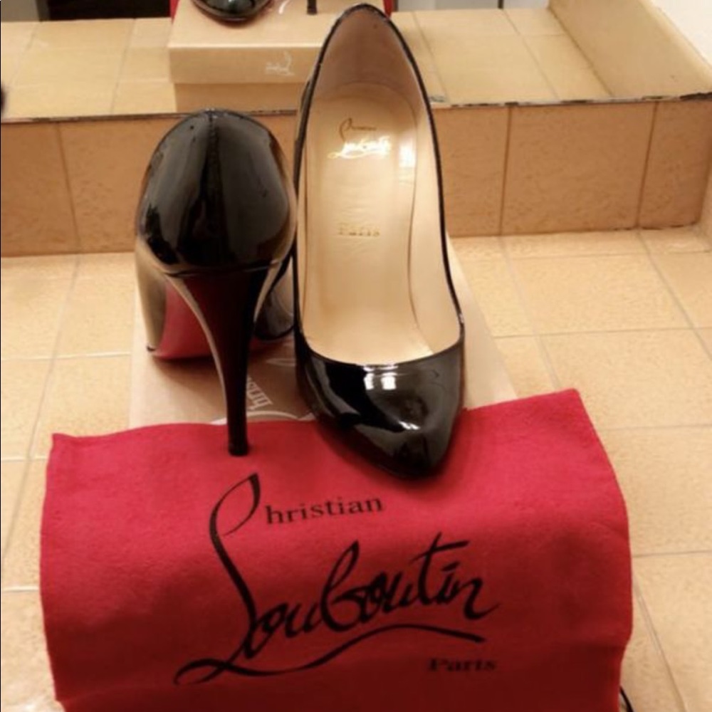Size 37.5 solid black Christian Louboutin pumps